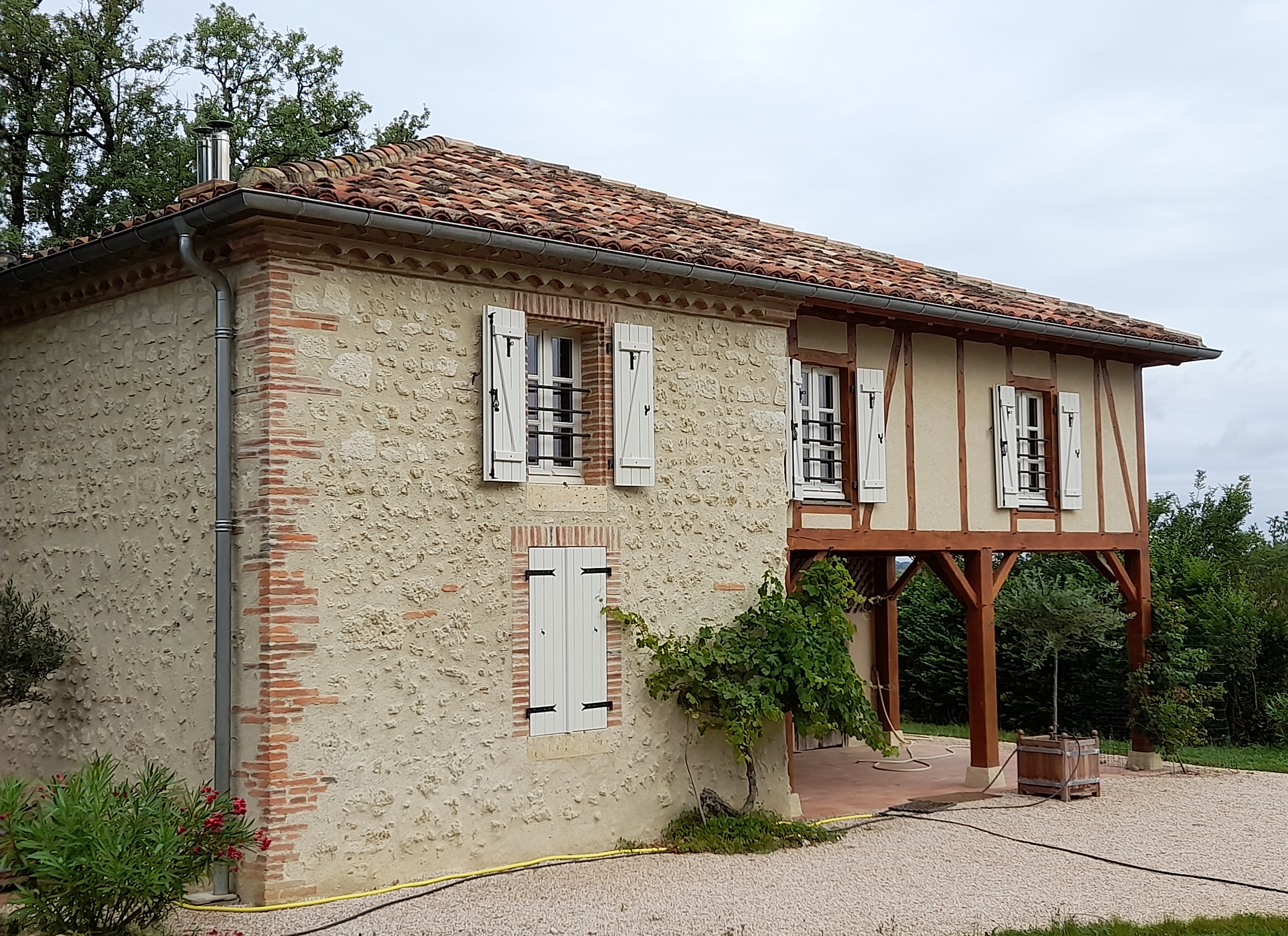 Image de maison avec reprise de charpente